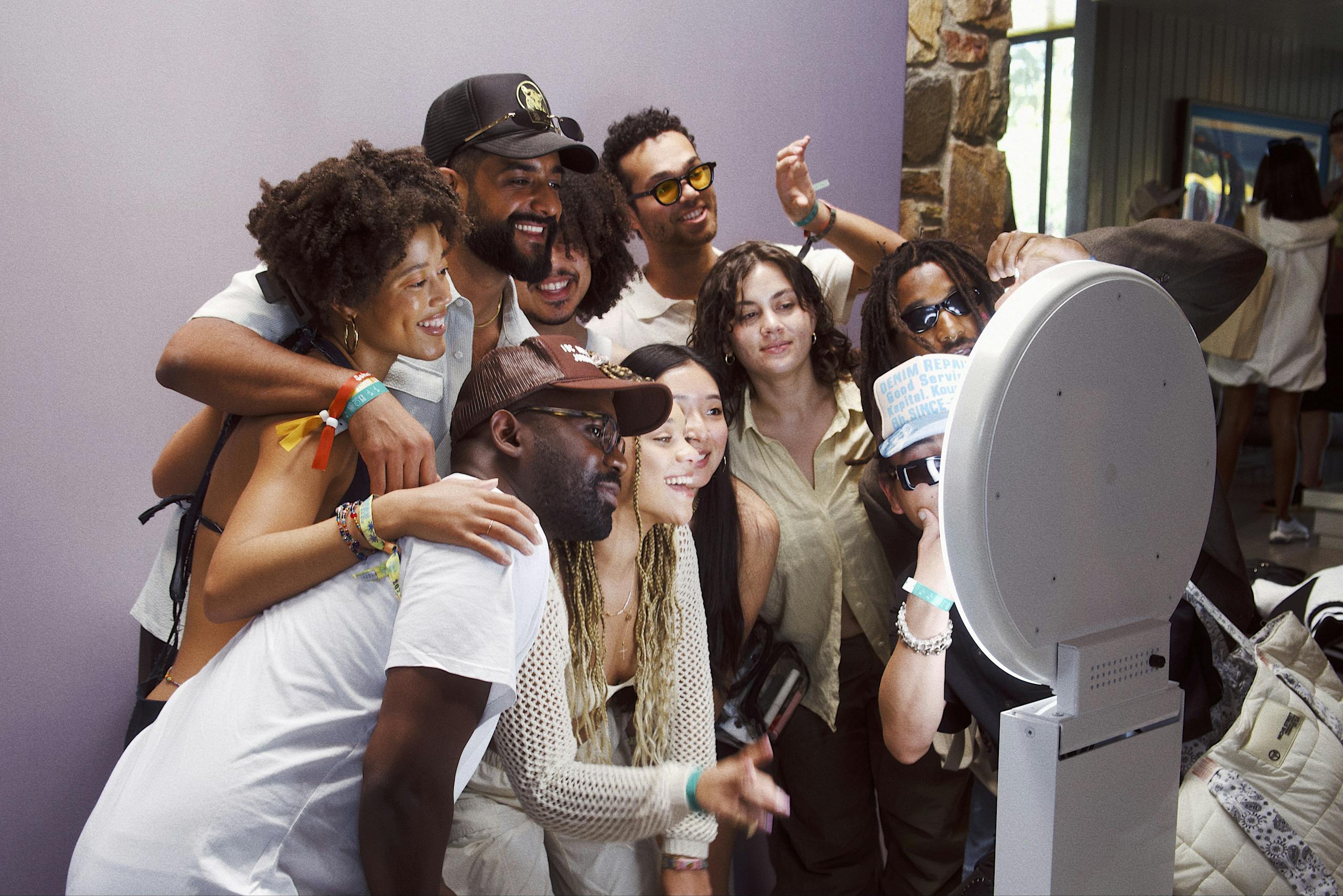 Group of friends using a Hive Photo Booth